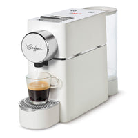 Máquina de café de cápsulas blanca de lado con taza de café